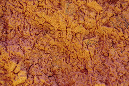 Details of rock stone texture, close up shot of rock surface. In red and brown colors. Textured...
