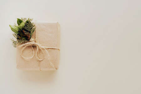 Eco Christmas gift boxes, copy space. Top view. On a beige background.の写真素材