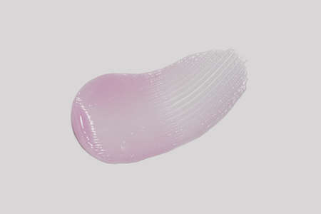 Cosmetic smear purple color on a light background. view from above.の写真素材