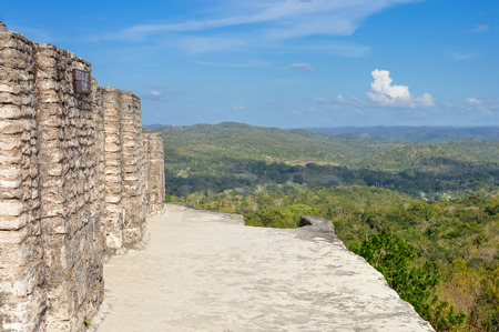 On top of the main pyramid at Xunantunich archaeological site of Maya civilization with some landscapes view, Cayo District near San Ignacio, Belizeの写真素材
