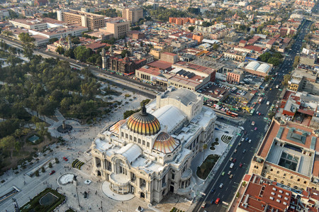 The view of the Palace of Fine Arts in Mexico city and Alameda Central Park seen from the top of the Latin American towerの写真素材