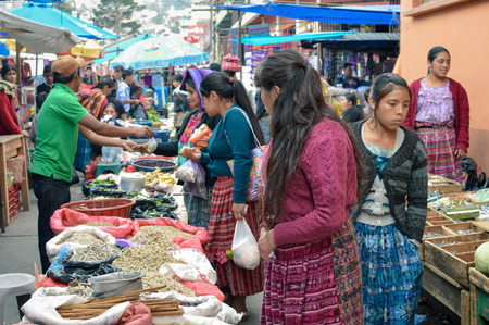 Totonicapan, Guatemala - February 10, 2015: Maya people shop at the big traditional market of a small colonial town of Totonicapan in Guatemala. Central Americaのeditorial素材