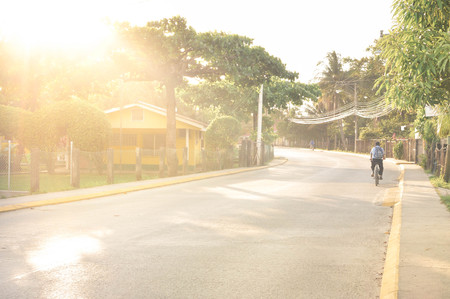 Sunny streets of a small rural Caribbean town of Omoa in Honduras, Central Americaの写真素材