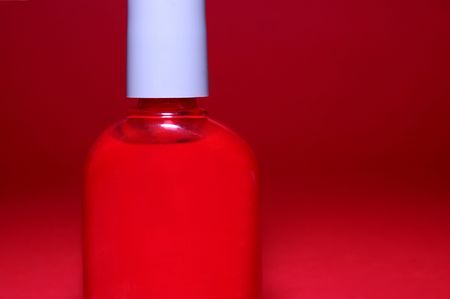 Closeup on a red nail polish の写真素材