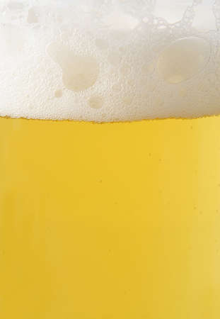 closeup on glass of beerの写真素材