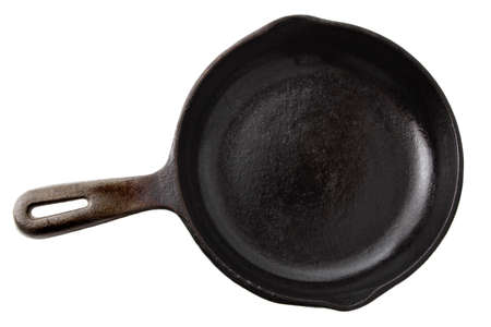 cast iron pan isolated on whiteの写真素材