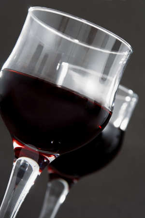 closeup on glass of red wineの写真素材