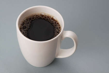 top view of a cup filled with black coffee