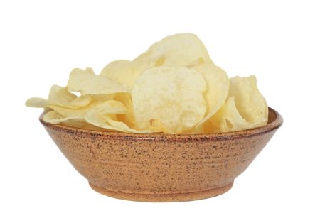 bowl of potato chips isolated on whiteの写真素材