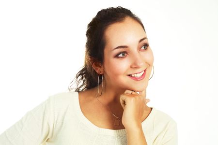 portrait of a beautiful young thoughtful woman against white background