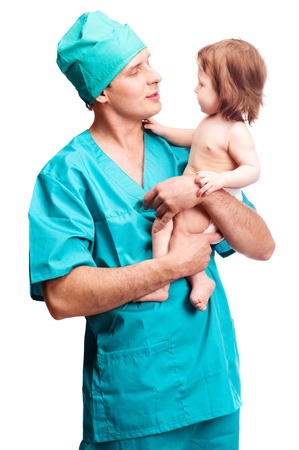 portrait of a surgeon holding a  baby, isolated against white backgroundの写真素材