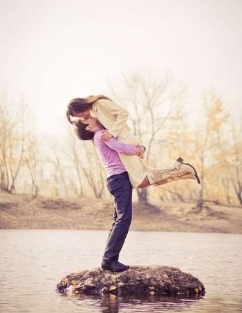 happy young couple  outdoor in the autumn park の写真素材