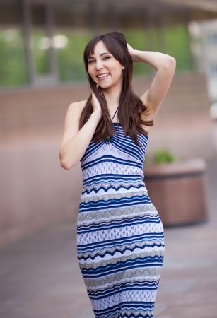 young laughing woman, outdoor on a summer dayの写真素材