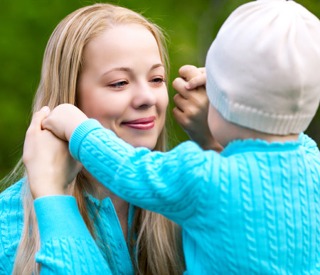 happy mpther and daughter in the parkの写真素材