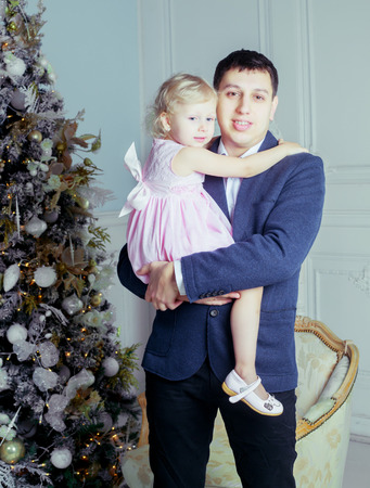 happy farther and daughter at home, Christmas timeの写真素材