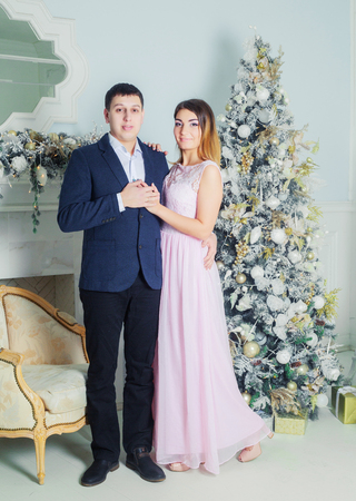 happy young couple  at home  at Christmas timeの写真素材