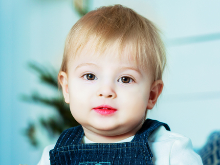 portriat of a cute boy at home  の写真素材