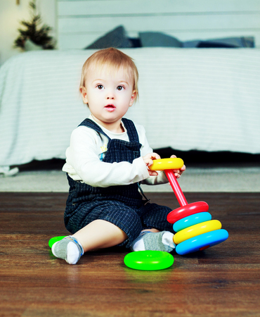 cute boy at home with toysの写真素材