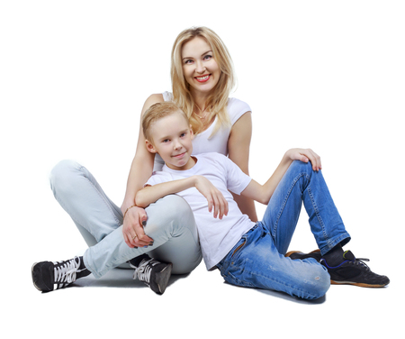 happy smiling mother and son, isolated against white backgroundの写真素材