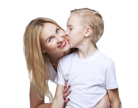 happy smiling mother and son, isolated against white backgroundの写真素材