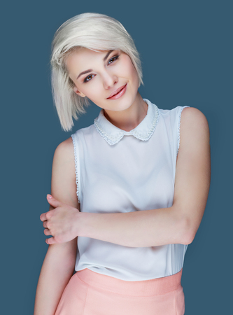 beautiful blond smiling woman, isolatedの写真素材