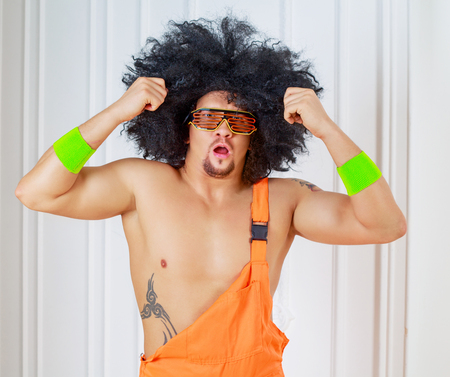 muscular dancer with retro halloween costumeの写真素材