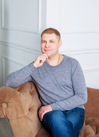 attractive yougn man at homeの写真素材