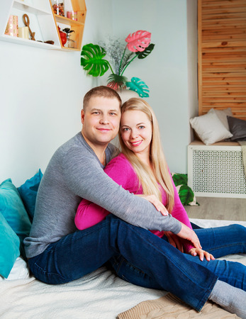 happy young couple at homeの写真素材