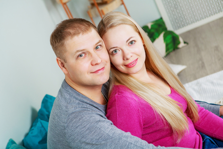 happy young couple in love at homeの写真素材