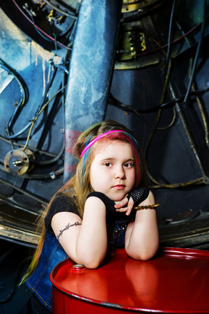 beautiful little girl in the steampunk styled photoshoot in the studioの写真素材