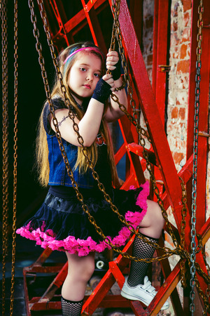 beautiful little girl in the steampunk styled photoshoot in the studioの写真素材