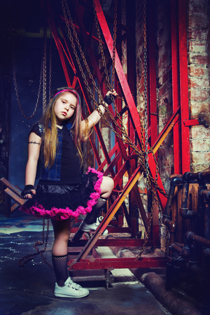 beautiful little girl in the steampunk styled photoshoot in the studioの写真素材