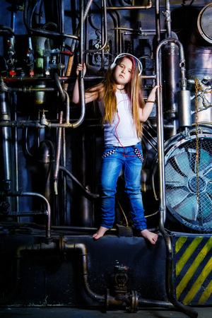 beautiful little girl in the steampunk styled photoshoot in the studioの写真素材