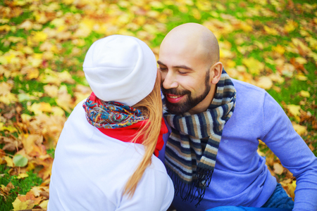 happy young couple walking and having fun in the autumn parkの写真素材