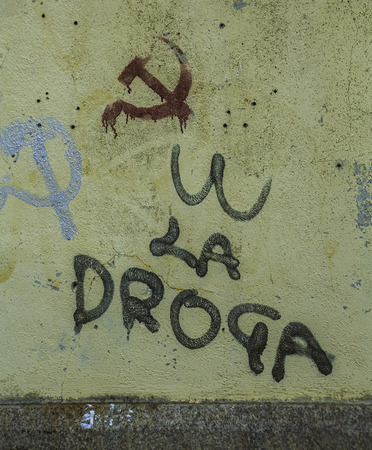 La Maddalena, Sardinia, Italy, old walls with communistic symbols   in the center of the townのeditorial素材
