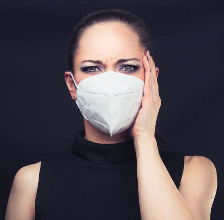 Woman wearing face mask, epidemia conceptの写真素材