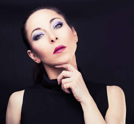 Portrait of young model with bright colorful makeupの写真素材