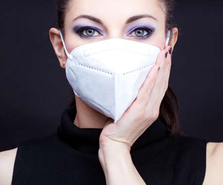Woman wearing face mask, epidemia conceptの写真素材