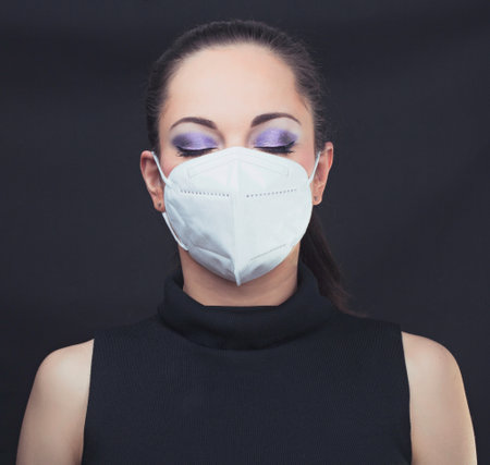 Woman wearing face mask, epidemia conceptの写真素材