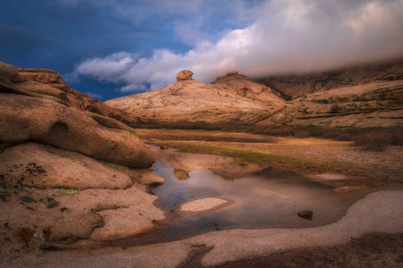 Beautiful landscape of rocky and desert mountains in the Bektau-Ata tract in central Kazakhstan after rainの写真素材