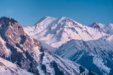 Beautiful mountain landscape with peaks of rocky mountains in Tien Shan, Alatau near Almaty city in Kazakhstanの写真素材