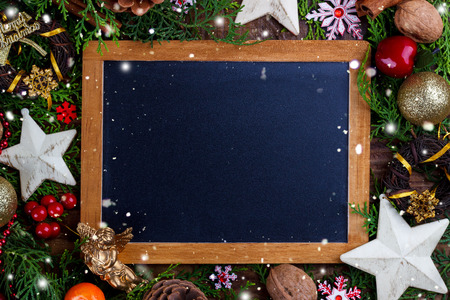 Christmas background. Fir branch with decorations with space for textの写真素材