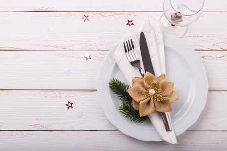 Christmas or new year table setting on white wooden table. Christmas card or menu templateの写真素材