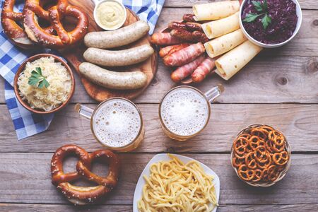 Octoberfest party dinner, Bavarian sausages, pretzels, beer, chilly cheese, cabbage salad, mustard...