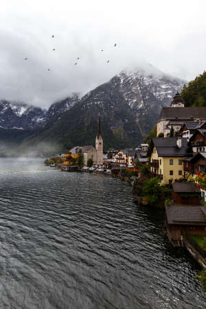 Hallstatt small town as postcard view on lake side, autumnの写真素材