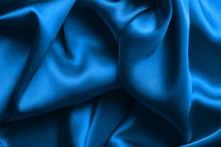Texture of blue silk fabric, close upの写真素材