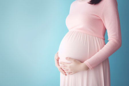 Young pregnant woman with hands on her belly Generative AIの素材