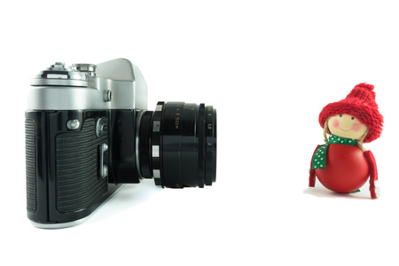 Retro camera and red toy on white backgroundの写真素材