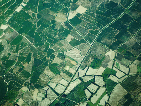 Field roads from the airplane wiht houses roof