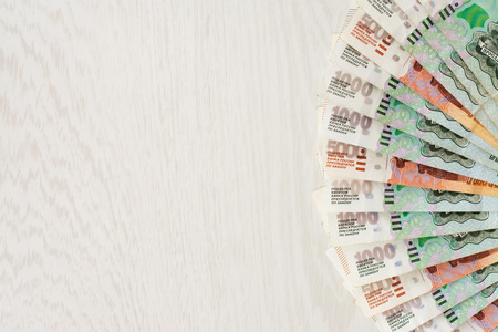 A lot of bills one and five thousand rubles fan and space for text close up
